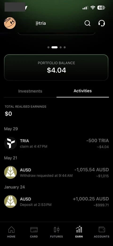 Earn activity showing an AUSD deposit in January and a withdrawal in May