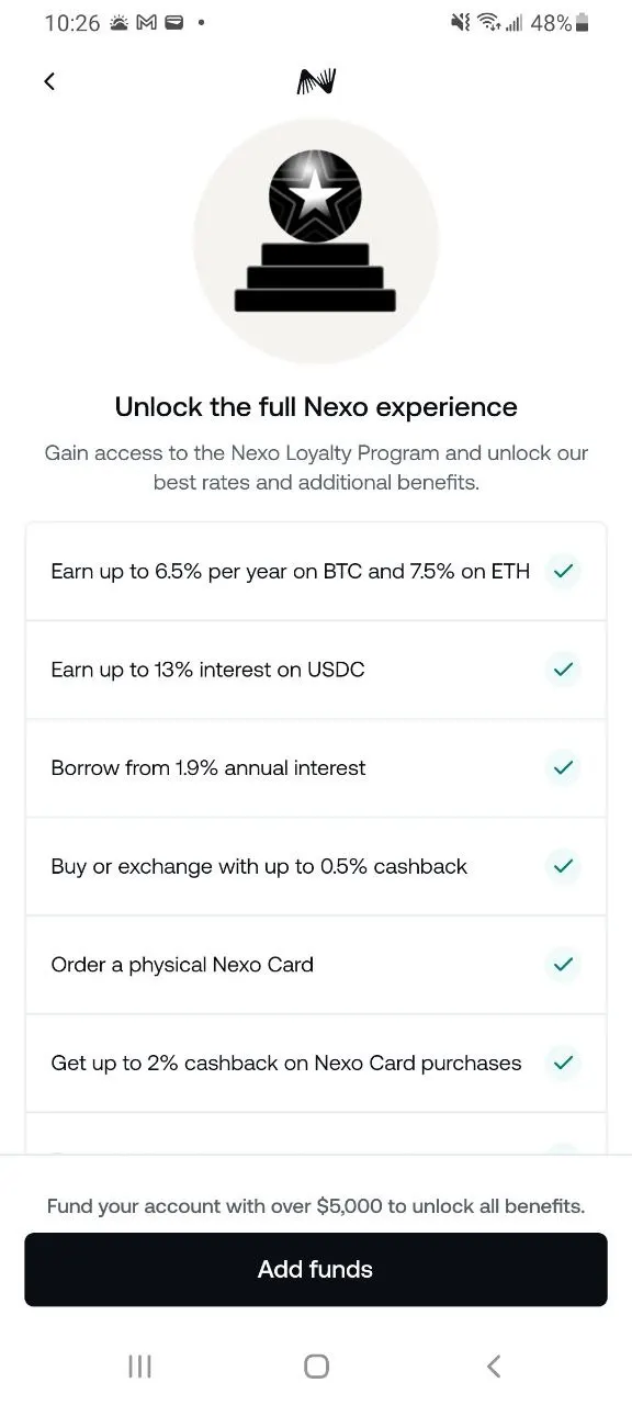 Nexo loyalty screen: earn up to 6.5% on BTC and 7.5% on ETH, up to 13% on USDC, borrow from 1.9%, up to 0.5% exchange cashback, up to 2% card cashback, with the footer Fund your account with over $5,000 to unlock all benefits