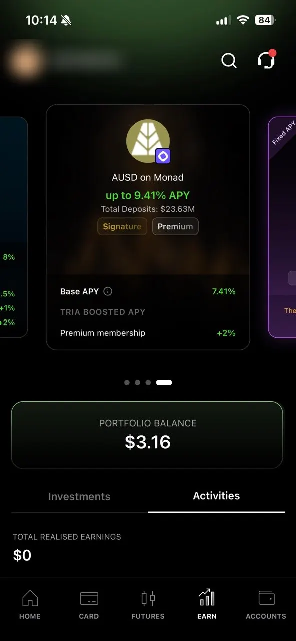 Tria Earn tab: AUSD on Monad up to 9.41% APY, base 7.41%, Premium boost +2%, total deposits $23.63M